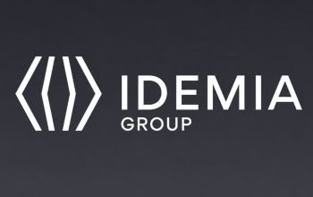 IDEMIA Group logo, provider of secure IoT connectivity for Spain's V-16 emergency beacon program.