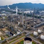 Oil refinery illustrating cybersecurity risks across energy infrastructure