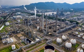 Oil refinery illustrating cybersecurity risks across energy infrastructure