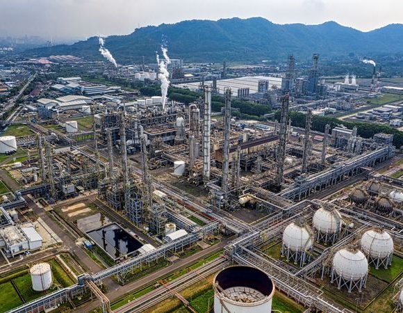 Oil refinery illustrating cybersecurity risks across energy infrastructure